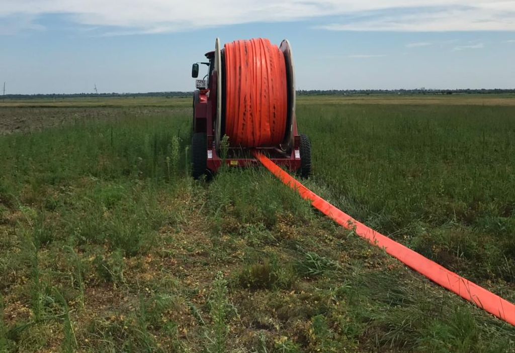 размотка шланга с катушки транспортировщика